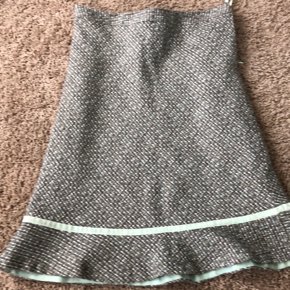 Cute skirt- wool with teal trim, teal lining.